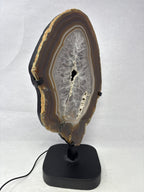 Agate Slice Chocolate with Amethyst Center On Illuminated Table Stand