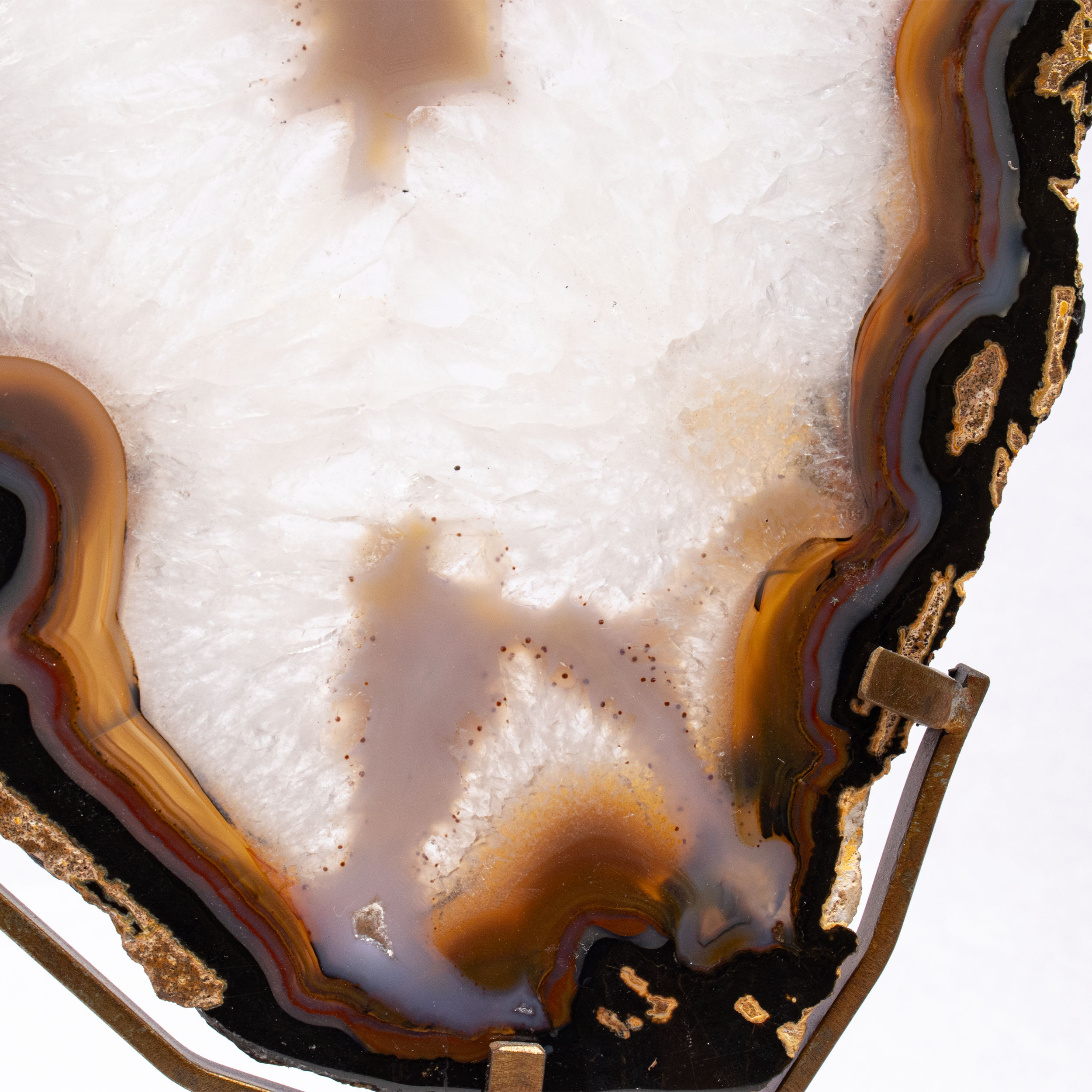 Agate Slice with Vibrant Colors and Intricate Patterns on a Custom Stand