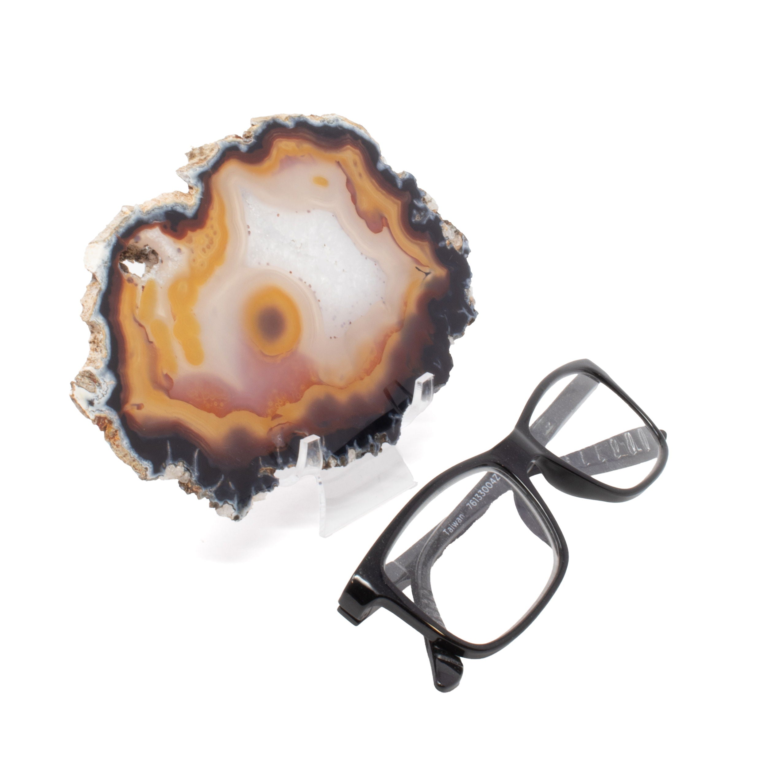 Agate Slice with Concentric Bands of White, Orange, Brown, and Charcoal on an Acrylic Stand